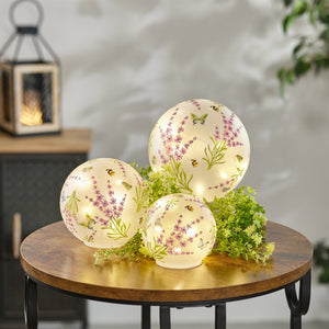 HomeRoots Set of Three Handcrafted Purple & Green Glass Tabletop Sculptures with Ambient LED Lighting 634147