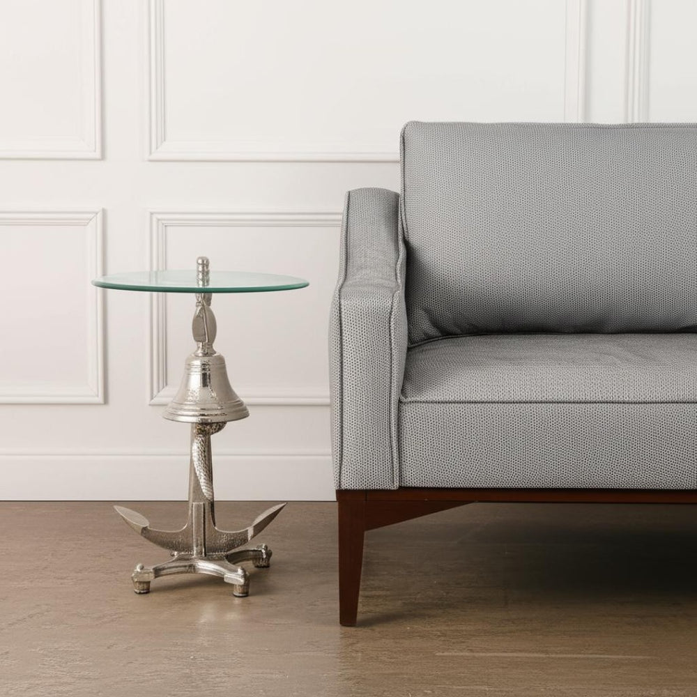 HomeRoots 24" Coastal-Inspired Clear Glass & Silver Aluminum Nautical Bell End Table for Modern Spaces 634159