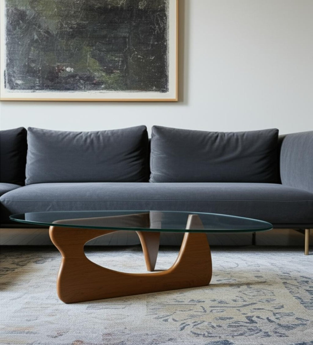 HomeRoots 54" Modern Abstract Triangle Coffee Table with Clear Glass Top & Sculptural Wooden Base Design 635429