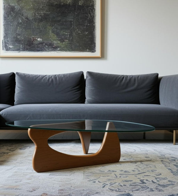 HomeRoots 54" Modern Abstract Triangle Coffee Table with Clear Glass Top & Sculptural Wooden Base Design 635429