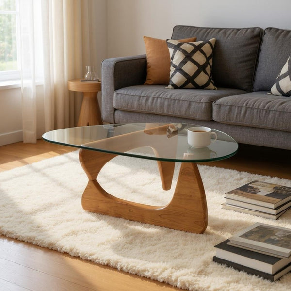 HomeRoots 54" Modern Abstract Triangle Coffee Table with Clear Glass Top & Sculptural Wooden Base Design 635429