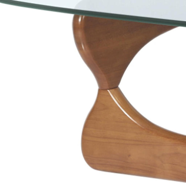 HomeRoots 54" Modern Abstract Triangle Coffee Table with Clear Glass Top & Sculptural Wooden Base Design 635429