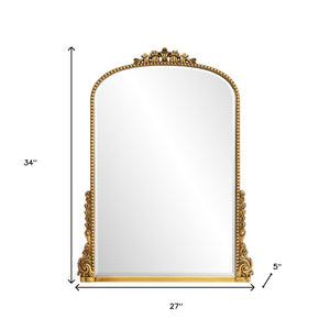 HomeRoots 34" Antiqued Gold Baroque Accent Mirror - Elegant Arched Design with Intricate Scrollwork & Beaded Trim 635507