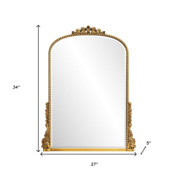 HomeRoots 34" Antiqued Gold Baroque Accent Mirror - Elegant Arched Design with Intricate Scrollwork & Beaded Trim 635507