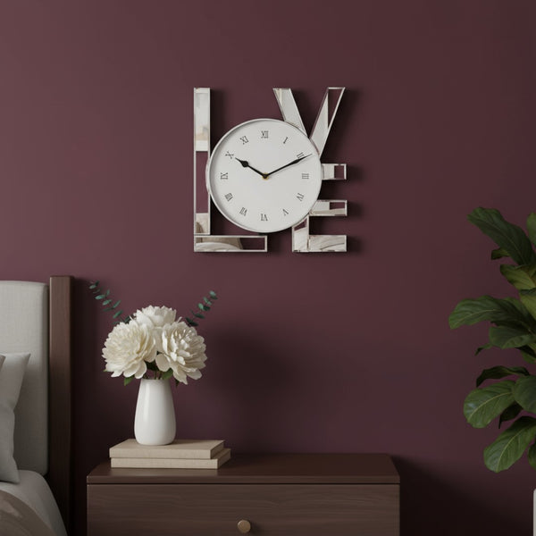 HomeRoots 11" Silver Mirrored Glass Love Wall Clock - Elegant Romance with Classic Roman Numerals & Sparkle Decor 635639