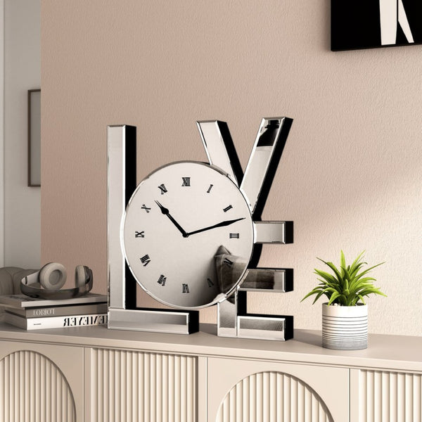 HomeRoots 11" Silver Mirrored Glass Love Wall Clock - Elegant Romance with Classic Roman Numerals & Sparkle Decor 635639