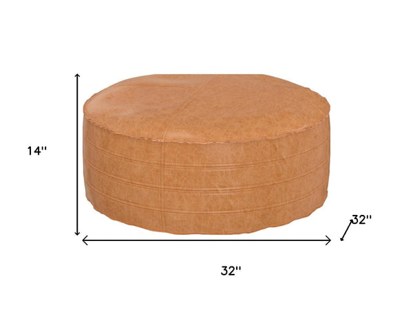 HomeRoots 32" Brown Faux Leather Round Pouf Ottoman - Versatile Bohemian Accent for Footrest, Seating & Decor 638511
