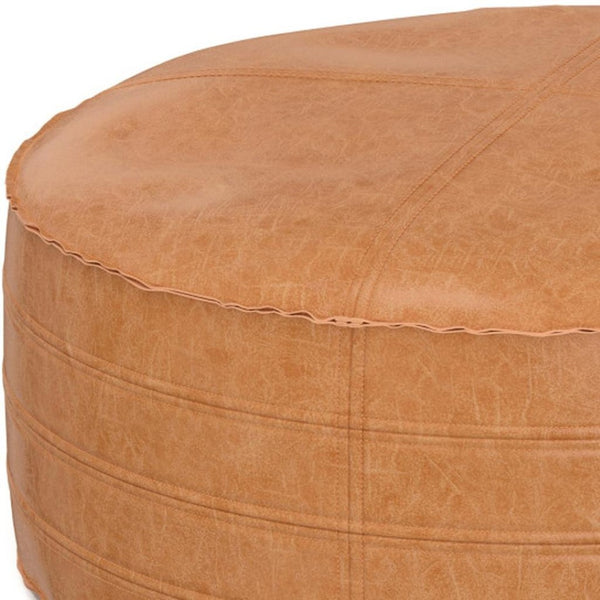 HomeRoots 32" Brown Faux Leather Round Pouf Ottoman - Versatile Bohemian Accent for Footrest, Seating & Decor 638511