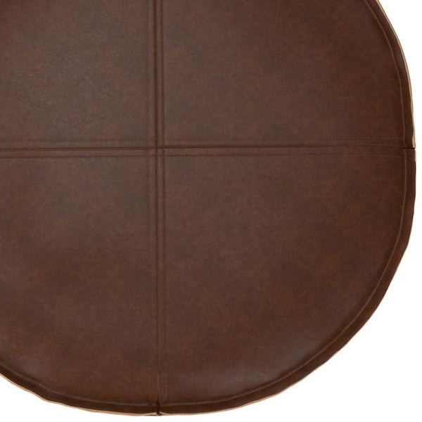 HomeRoots 20" Brown Faux Leather Round Pouf Ottoman - Stylish Versatile Footrest & Extra Seating for Any Room 638522