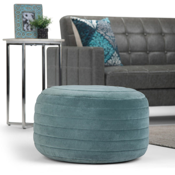 HomeRoots 20" Blue Velvet Round Pouf Ottoman - Stylish, Versatile Footrest & Extra Seat for Any Room Decor 638535
