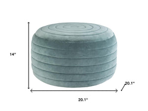 HomeRoots 20" Blue Velvet Round Pouf Ottoman - Stylish, Versatile Footrest & Extra Seat for Any Room Decor 638535