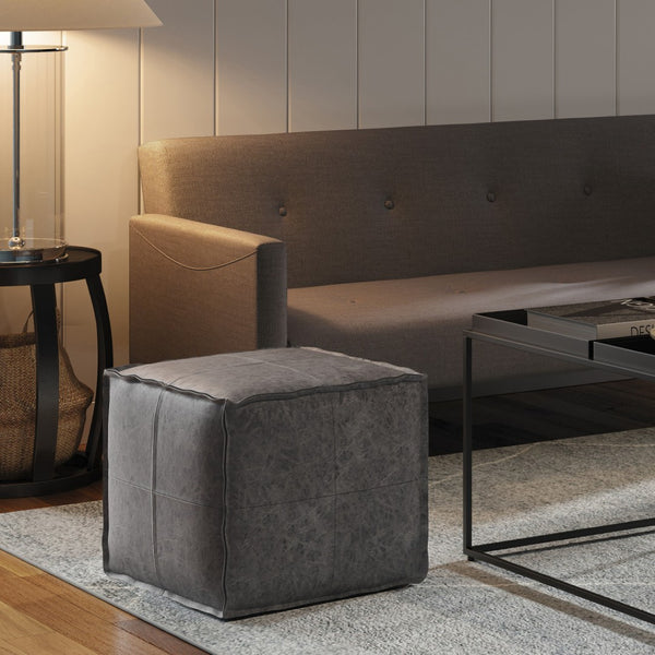 HomeRoots 18" Black Faux Leather Pouf Ottoman - Modern Chic Design for Footrest, Extra Seating & Accent Style 638537