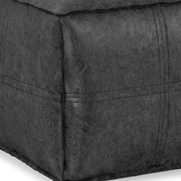 HomeRoots 18" Black Faux Leather Pouf Ottoman - Modern Chic Design for Footrest, Extra Seating & Accent Style 638537