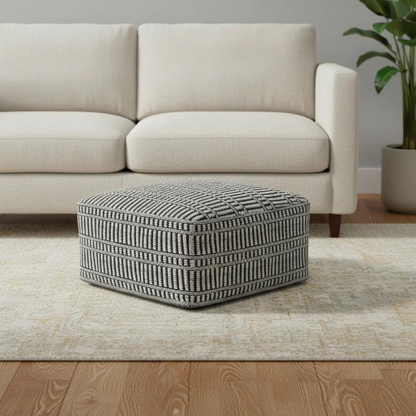 HomeRoots 20" Black Fabric Pouf Ottoman - Stylish Multifunctional Footrest & Extra Seat for Modern Living Spaces 638540