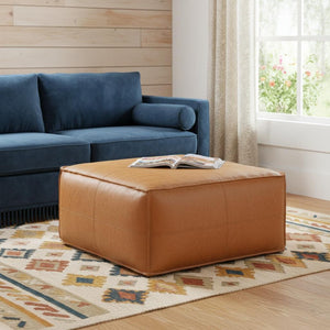 HomeRoots 30" Brown Faux Leather Pouf Ottoman - Versatile Seating & Chic Footrest for Modern Living Spaces 638542