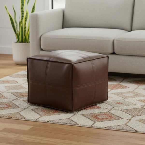 HomeRoots 18" Brown Faux Leather Pouf Ottoman - Versatile Accent for Modern Spaces, Footrest or Extra Seating 638543