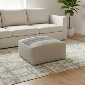 HomeRoots 20" Gray Fabric Pouf Ottoman - Versatile, Stylish Footrest and Seating Solution for Any Room Decor 638548