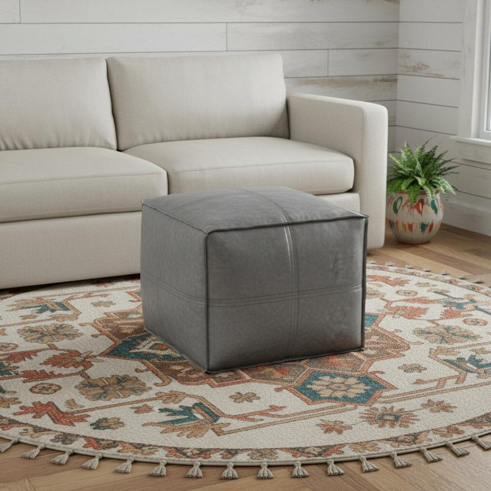 HomeRoots 18" Gray Faux Leather Pouf Ottoman - Modern Versatile Seating & Footrest for Stylish Small Spaces 638549