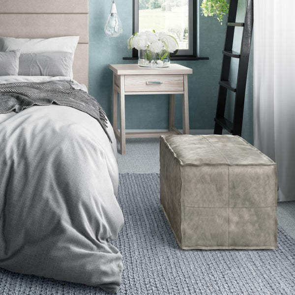HomeRoots 18" Gray Faux Leather Pouf Ottoman - Modern Versatile Seating & Footrest for Stylish Small Spaces 638549