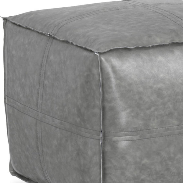 HomeRoots 18" Gray Faux Leather Pouf Ottoman - Modern Versatile Seating & Footrest for Stylish Small Spaces 638549