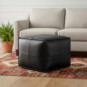 HomeRoots 18" Black Leather Pouf Ottoman - Stylish Modern Footrest & Versatile Seating for Chic Spaces 638570
