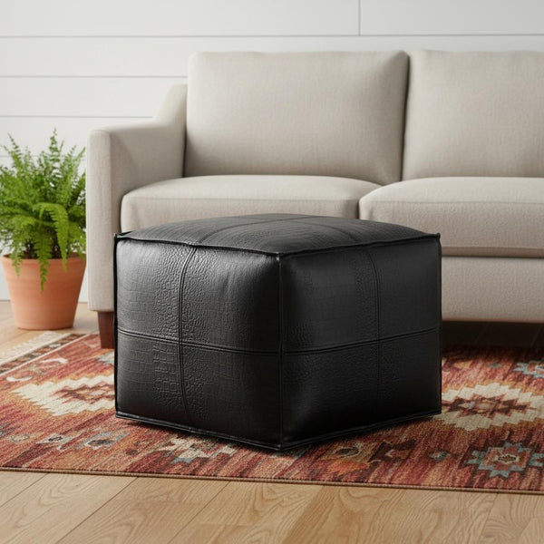 HomeRoots 18" Black Leather Pouf Ottoman - Stylish Modern Footrest & Versatile Seating for Chic Spaces 638570