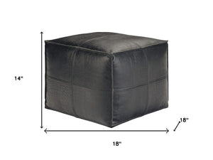 HomeRoots 18" Black Leather Pouf Ottoman - Stylish Modern Footrest & Versatile Seating for Chic Spaces 638570