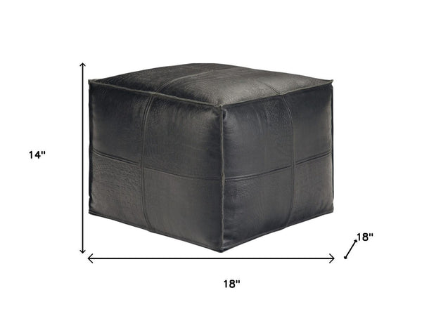 HomeRoots 18" Black Leather Pouf Ottoman - Stylish Modern Footrest & Versatile Seating for Chic Spaces 638570