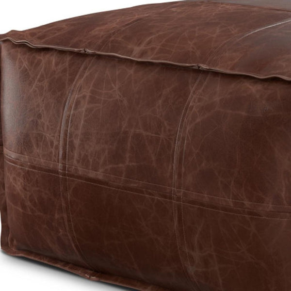HomeRoots 26" Brown Leather Pouf Ottoman - Stylish Versatile Seating & Footrest for Modern Living Spaces 638575
