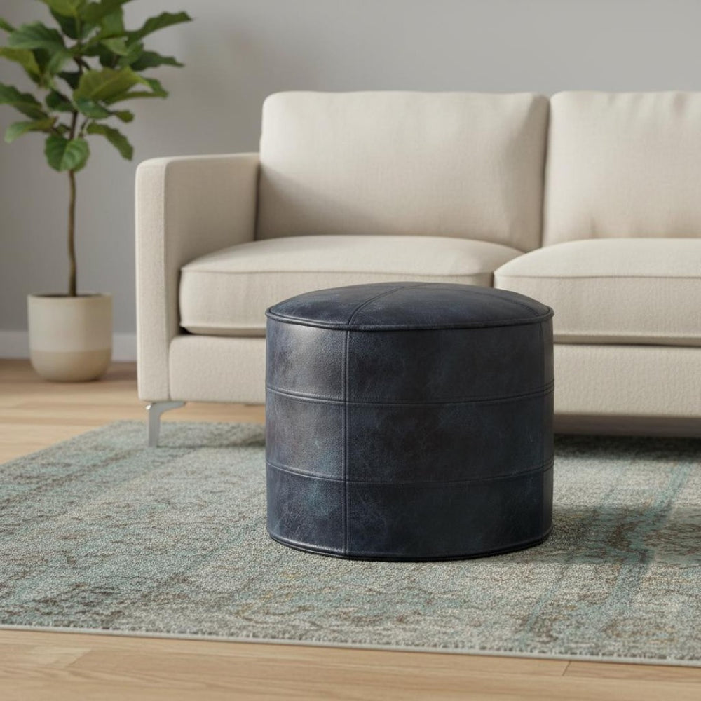 HomeRoots 18" Blue Leather Round Pouf Ottoman - Chic Modern Seating, Stylish Footrest & Versatile Home Accent 638577