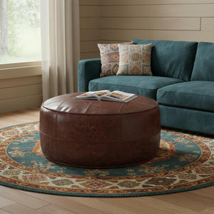 HomeRoots 34" Brown Leather Round Pouf Ottoman - Versatile Footrest, Extra Seating & Stylish Accent for Any Room 638578