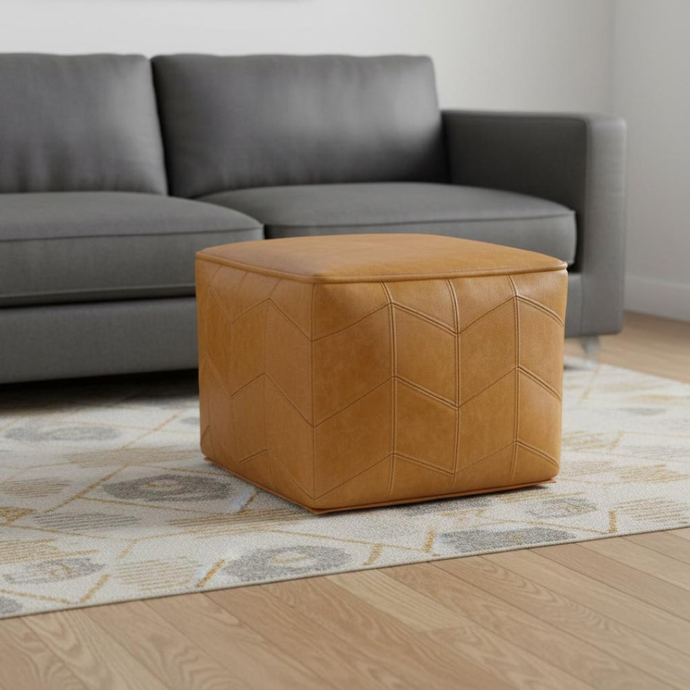 HomeRoots 18" Brown Leather Pouf Ottoman - Versatile Accent Piece for Modern Living, Bedroom, or Nursery Decor 638579