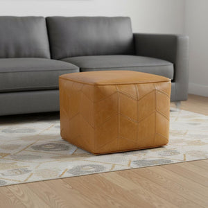 HomeRoots 18" Brown Leather Pouf Ottoman - Versatile Accent Piece for Modern Living, Bedroom, or Nursery Decor 638579