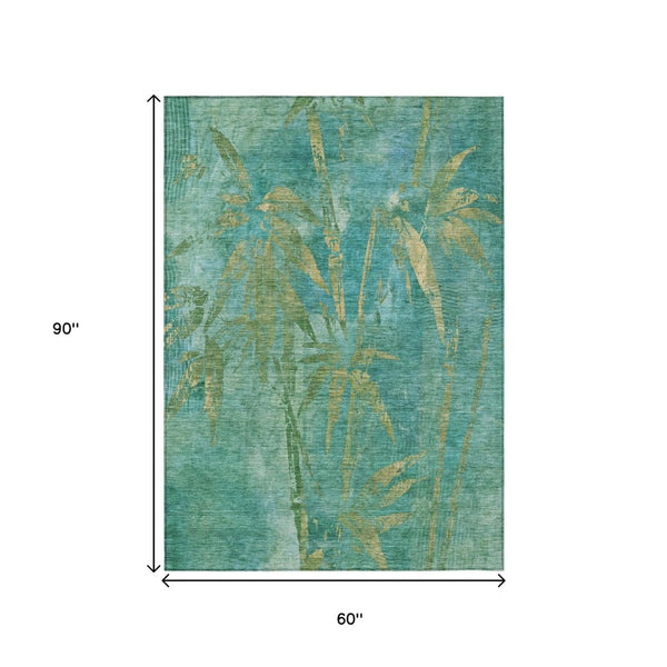 HomeRoots 5' X 8' Teal Blue Gold Botanical Leaves Rug - Stylish, Durable, Machine Washable for Indoor/Outdoor Use 639240