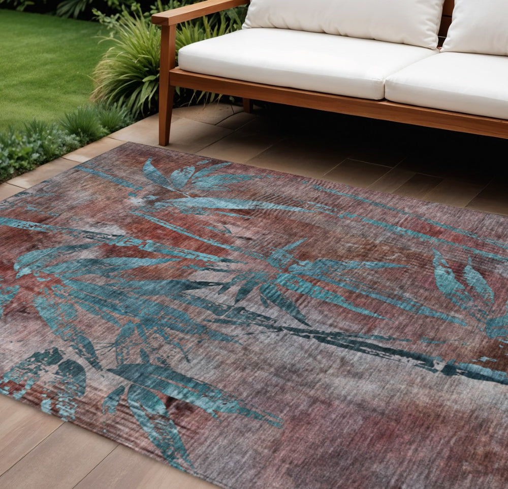 HomeRoots 10' Vibrant Terra Cotta and Teal Blue Botanical Leaves Washable Area Rug for Indoor & Outdoor Spaces 639250
