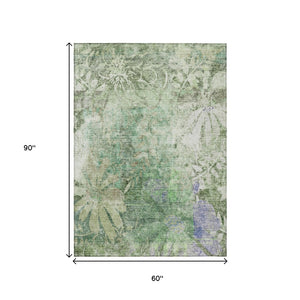 HomeRoots 5' Teal Blue & Ivory Floral Washable Area Rug - Durable, Stylish, Indoor/Outdoor for High-Traffic Spaces 639270
