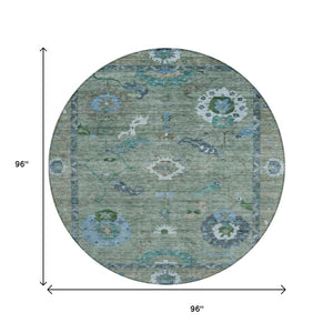 HomeRoots 8' Round Floral Medallion Area Rug in Artichoke Green & Denim Blue – Washable for Indoor/Outdoor Use 639469