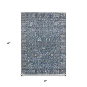 HomeRoots 5' X 8' Blue and Ivory Floral Area Rug - Durable, Washable Design for Indoor & Outdoor Spaces 639552