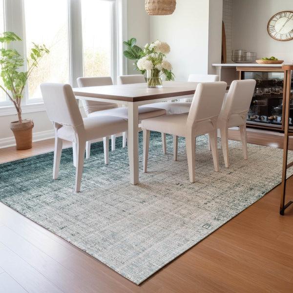 HomeRoots 5' Teal Blue and Ivory Striped Indoor-Outdoor Area Rug - Durable, Washable, Coastal Style for Any Space 639900