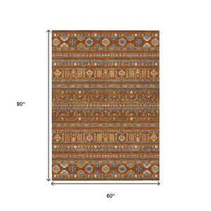 HomeRoots 5' X 8' Tribal Washable Area Rug in Rust, Blue, and Ivory – Durable Indoor/Outdoor Decor Solution! 640059