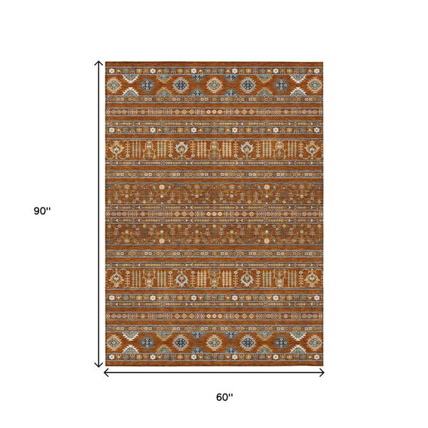 HomeRoots 5' X 8' Tribal Washable Area Rug in Rust, Blue, and Ivory – Durable Indoor/Outdoor Decor Solution! 640059