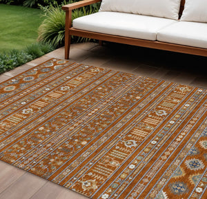 HomeRoots 10' X 14' Stylish Rust Blue Ivory Tribal Washable Area Rug for Indoor & Outdoor High-Traffic Spaces 640063