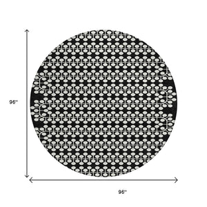 HomeRoots 8' Black And Ivory Geometric Round Area Rug – Durable, Washable Design for Indoor/Outdoor Spaces 640291