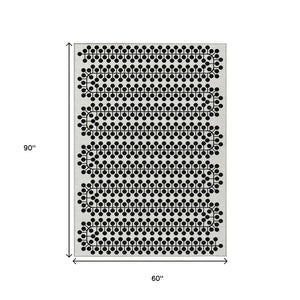 HomeRoots 5' Modern Ivory and Black Geometric Area Rug - Washable, Durable, Indoor/Outdoor, Kid & Pet Friendly! 640315