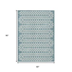 HomeRoots 5' X 8' Teal Blue & Ivory Geometric Area Rug - Stylish, Washable, Durable for Indoor & Outdoor Use! 640350