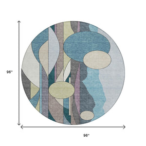 HomeRoots 8' Teal Blue Ivory and Green Round Geometric Rug - Stylish, Washable for Indoor & Outdoor Use 640528