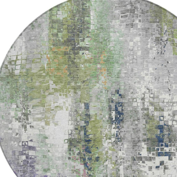 HomeRoots 8' Round Abstract Area Rug in Artichoke Green, Ivory & Purple - Washable for Indoor & Outdoor Use 640564