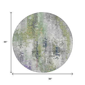 HomeRoots 8' Round Abstract Area Rug in Artichoke Green, Ivory & Purple - Washable for Indoor & Outdoor Use 640564