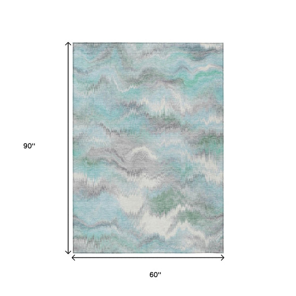 HomeRoots 5' X 8' Teal Blue Abstract Indoor/Outdoor Area Rug - Stylish, Washable, and Stain-Resistant Design! 640775