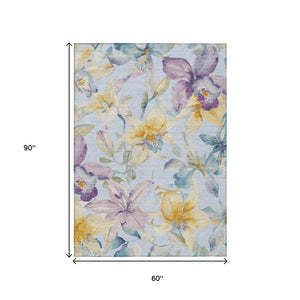 HomeRoots 5' X 8' Floral Area Rug - Sky Blue, Gold & Lavender - Washable, Durable, Indoor/Outdoor Use! 640955
